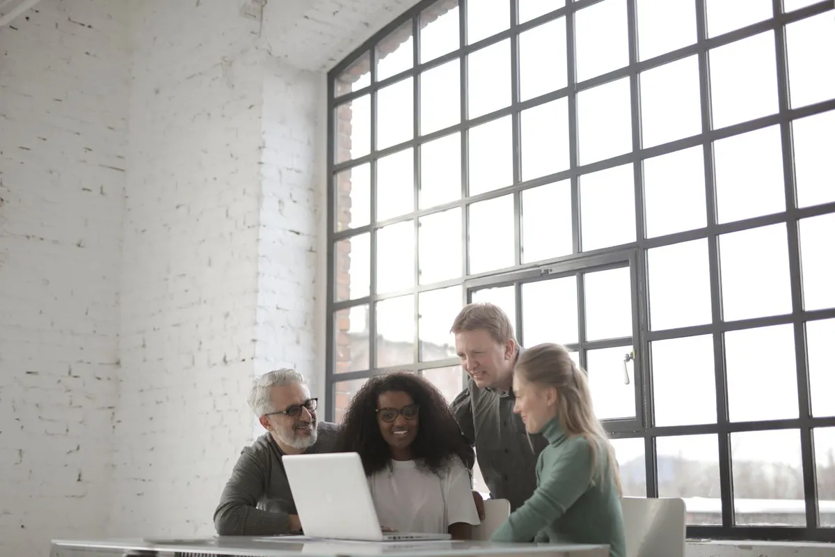 A diverse team collaborating on a transformation project
