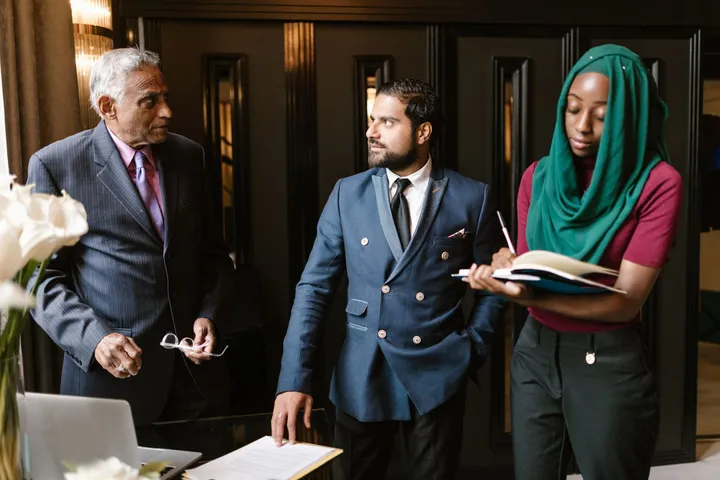 A team of business professionals in a working meeting — Avaib