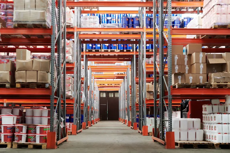 A large manufacturing warehouse with stocked shelves — Avaib