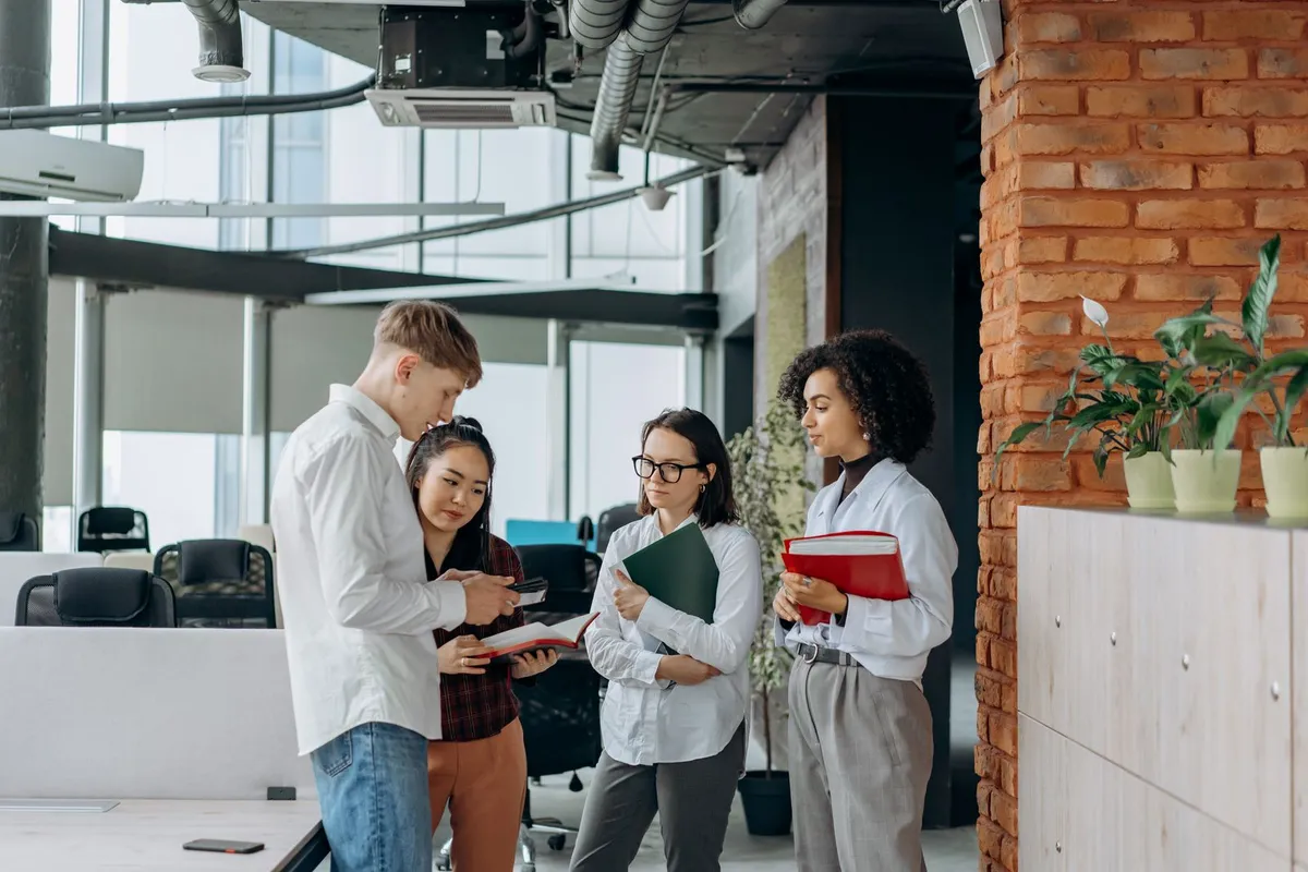 A professional services team collaborating in a modern office