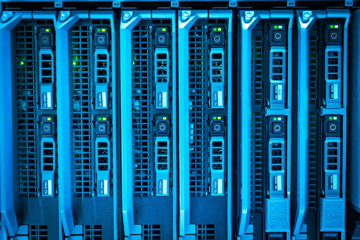 Cloud servers glowing blue in a data center