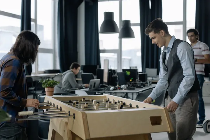 A SaaS product team at work in a startup office — Avaib