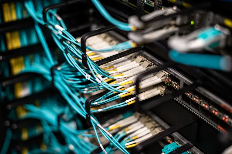Network cables in a data-centre patch panel — cloud infrastructure at Avaib — Avaib