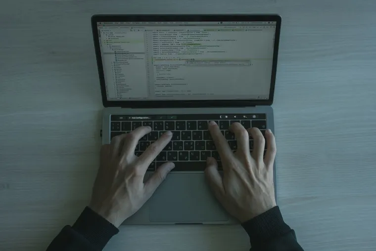 An engineer building a cloud application on a laptop — Avaib — Avaib