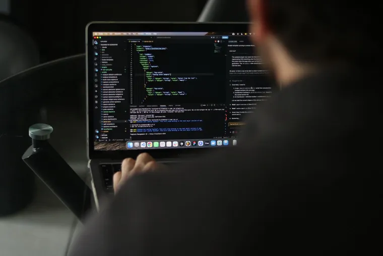 A web developer debugging JavaScript on a laptop — Avaib — Avaib