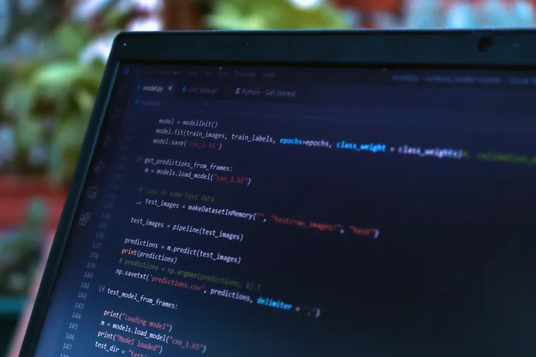 A developer building a Python web platform on screen — Python development at Avaib — Avaib