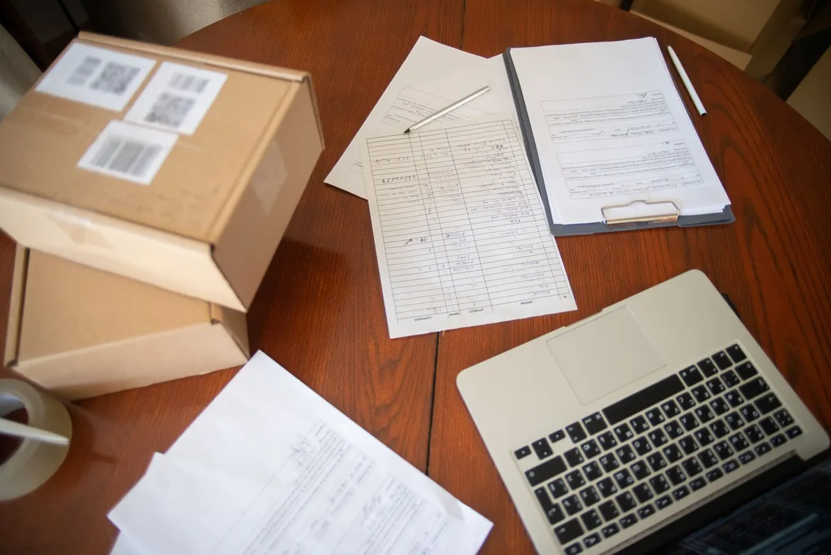 Paperwork and documents being processed at a desk