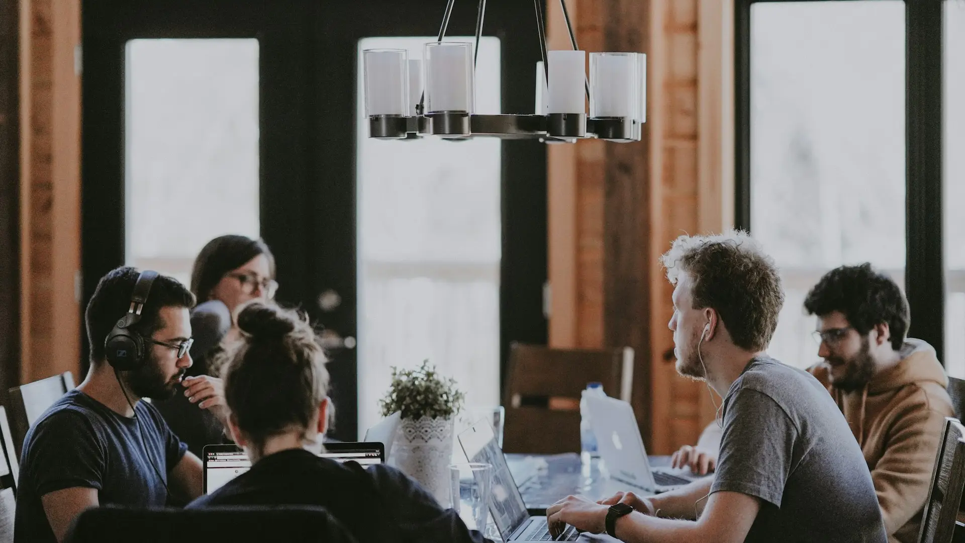 Two teams shaking hands on a partnership — Avaib partner programme